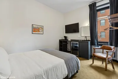 Guest room at Logan Square SRO Hotel
