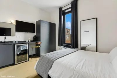 Guest room at Logan Square SRO Hotel