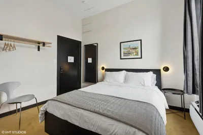 Guest room at Logan Square SRO Hotel