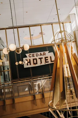 Historic Cedar Hotel signage in the atrium at Viceroy Chicago